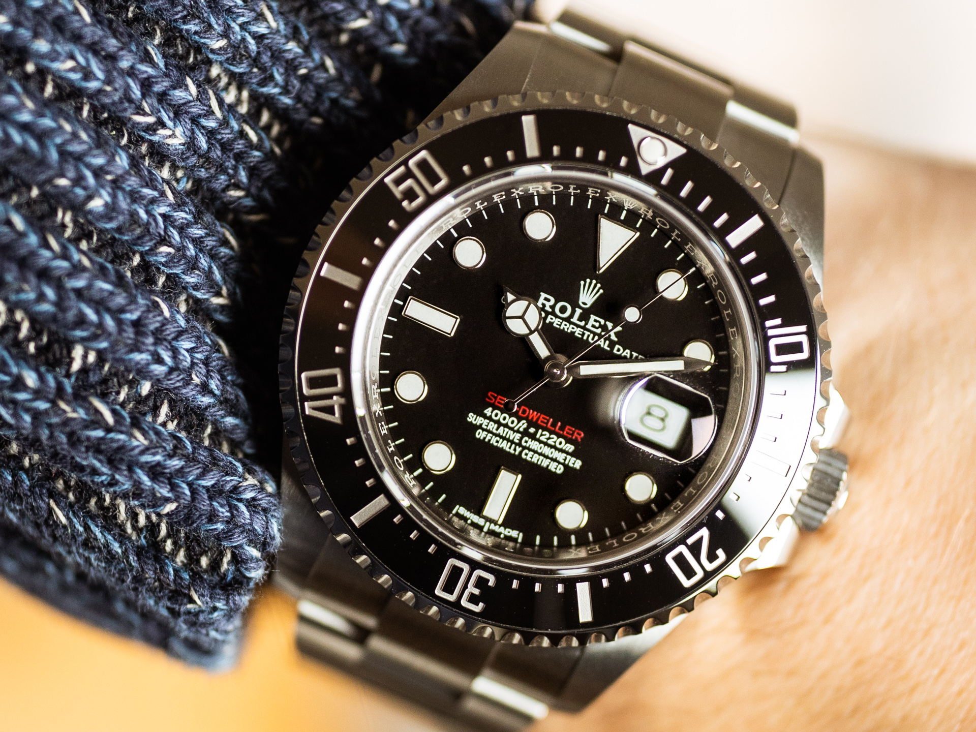 Rolex sea sales dweller red writing